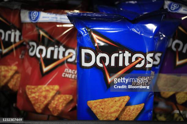 Bags of PepsiCo Inc. Brand Doritos for sale at a grocery store in Bagdad, Kentucky, U.S., on Friday, April 9, 2021. PepsiCo Inc. Is scheduledto...
