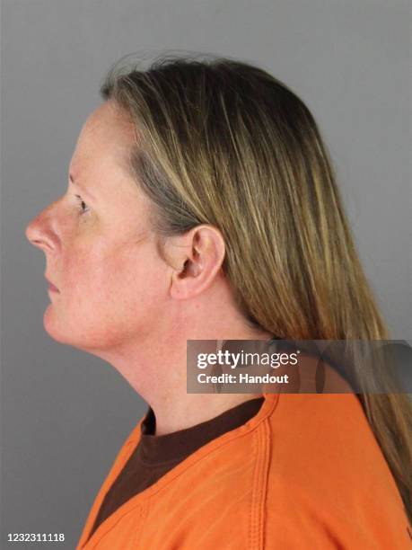In this handout provided by the Hennepin County Sheriff's Office, former Brooklyn Center Police Officer Kim Potter poses for a mugshot at the...