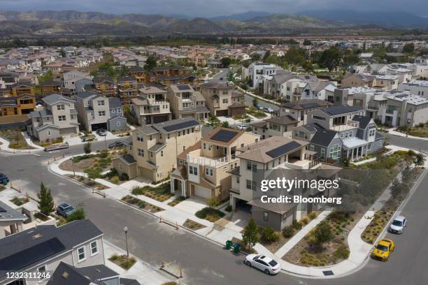 Single-family homes, both finished and under construction, in the Cadence Park development of The Great Park Neighborhoods in Irvine, California,...