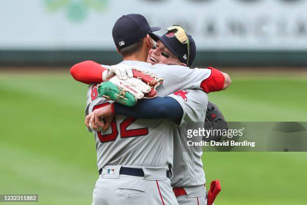 Alex Verdugo and Matt Barnes of the Boston Red Sox celebrate their victory against the Minnesota Twins during game one of a doubleheader at Target...