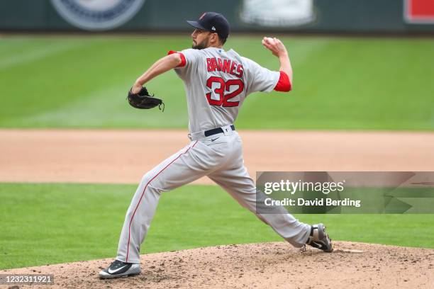 Matt Barnes of the Boston Red Sox delivers a pitch against the Minnesota Twins in the seventh inning during game one of a doubleheader at Target...