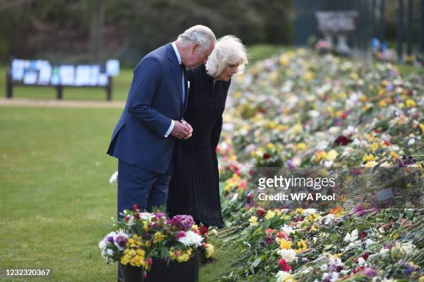 Prince Charles, Prince of Wales and Camilla, Duchess of Cornwall visit the gardens of Marlborough House, London, to view the flowers and messages...