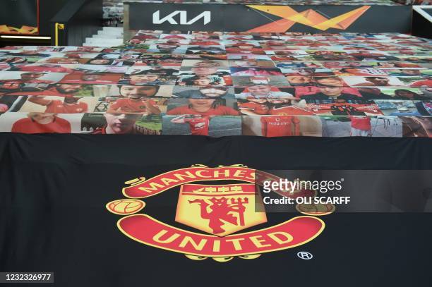 The new black pitch-side seat coverings with the United logo is seen ahead of the UEFA Europa league quarter final, second leg football match between...