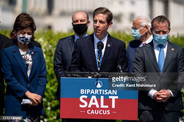 Rep. Mike Levin , center, speaks while being flanked by Rep. Young Kim and Rep. Josh Gottheimer at a news conference announcing the newly formed...