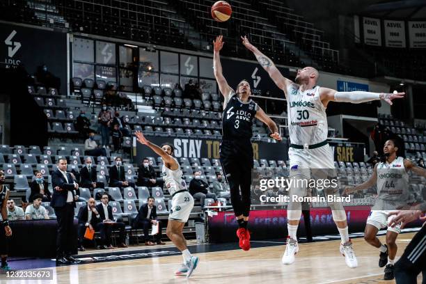 Thomas HEURTEL of Lyon and Maciej LAMPE of Limoges and Philip SCRUBB of Limoges during the French Cup - Semi final match between LDLC Asvel and...