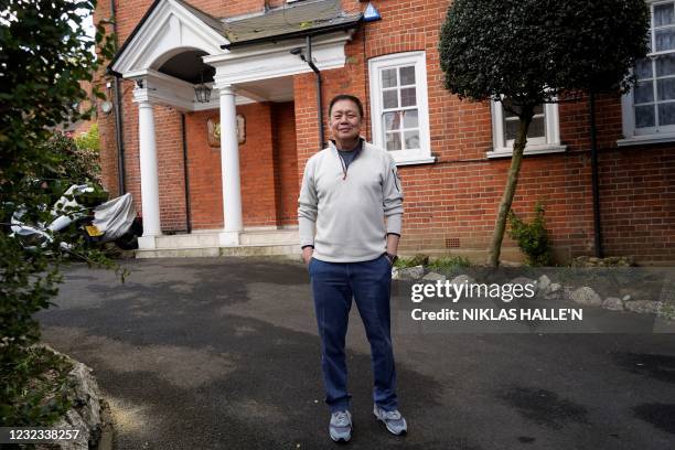 Myanmar's Ambassador to the United Kingdom, Kyaw Zwar Minn poses outside his residence in northwest London on April 16, 2021. - The ambassador was...