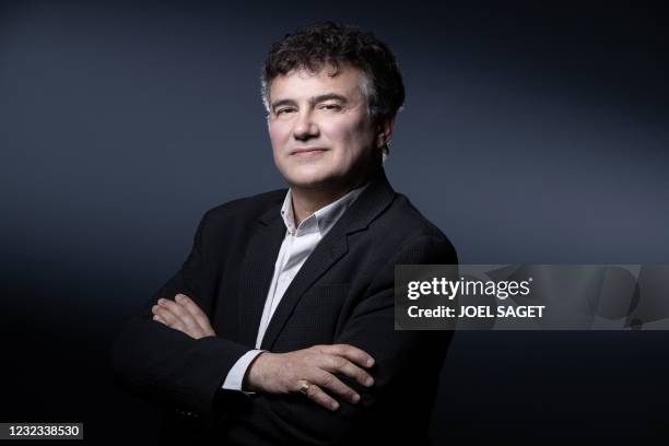 Patrick Pelloux, chairman of Association des médecins urgentistes de France poses during a photo session in Paris on April 15, 2021.