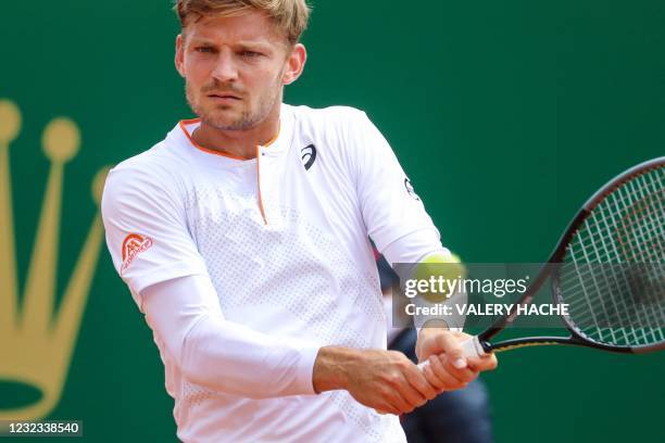 Belgium's David Goffin plays a return during his quarter final singles match against Britain's Daniel Evans on day seven of the Monte-Carlo ATP...