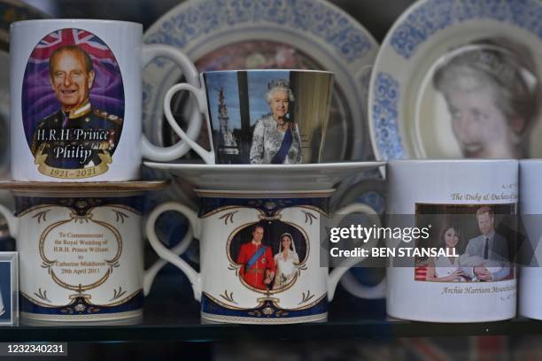 Royal memorabilia is displayed in a shop window in Windsor, west of London, on April 16 following the April 9 death of Britain's Prince Philip, Duke...