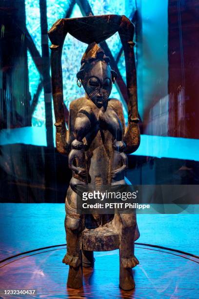 Maternity Senufo seat in wood and metal is photographed for Paris Match in the Museum Quai Branly-Jacques Chirac at a new permanent exhibition space...