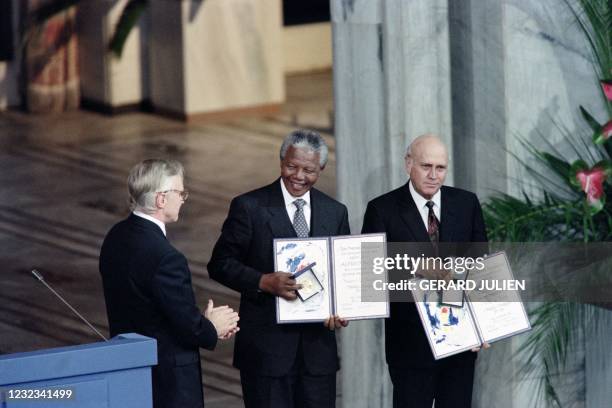 Nelson Mandela, President of South African African National Congress and South African President Frederik de Klerk display on December 09, 1993 in...