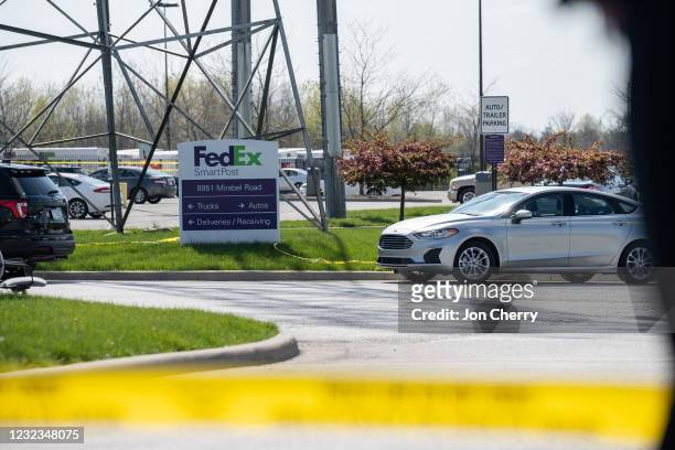 FedEx SmartPost sign is seen surrounded by crime scene tape at a FedEx Ground facility on April 16, 2021 in Indianapolis, Indiana. The area is the...