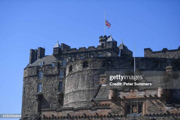 Union flag flies at half-mast from Edinburgh Castle to mark the death of the Duke of Edinburgh on April 17, 2021 in Edinburgh, United Kingdom. The...