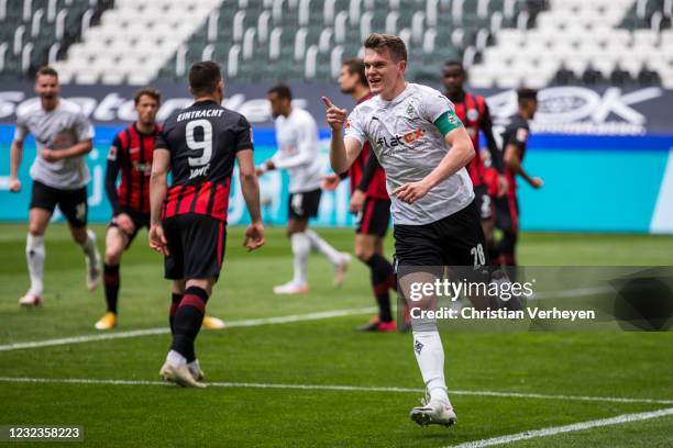 Matthias Ginter of Borussia Moenchengladbach celebrates after he scored his teams first goal during the Bundesliga match between Borussia...