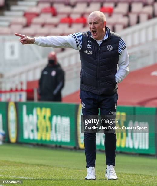 Queens Park Rangers manager Mark Warburton shouts instructions to his team from the technical area during the Sky Bet Championship match between...