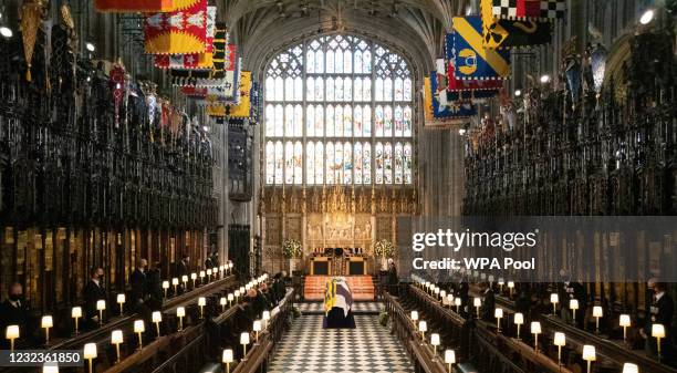 The Duke of Edinburgh’s coffin, covered with His Royal Highness’s Personal Standard lies in St George’s Chapel during the funeral of Prince Philip,...