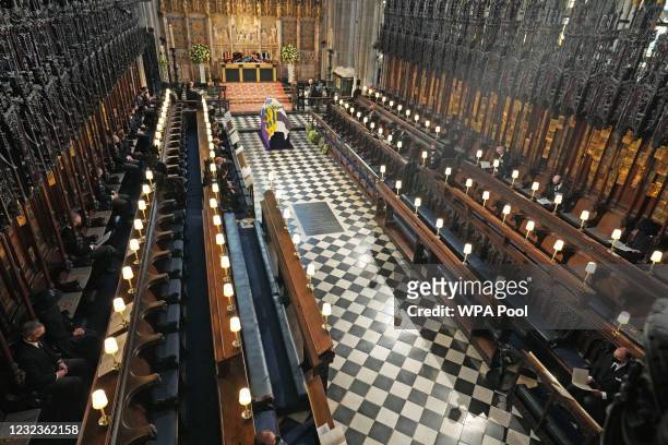 The Duke of Edinburgh’s coffin, covered with His Royal Highness’s Personal Standard lies in St George’s Chapel during the funeral of Prince Philip,...