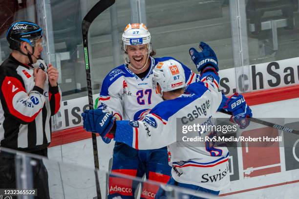 Roman Wick of ZSC Lions celebrates his goal with Marco Pedretti during the Swiss National League Playoff game between Lausanne HC and ZSC Lion at...