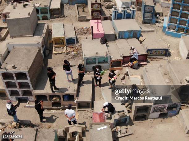 Aerial view during the burial of Jesús Sánchez Turín who died of COVID according to his relatives, at "Martires 19 de Julio" cemetery on April 17,...