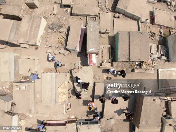 Aerial view during the burial of Jesús Sánchez Turín who died of COVID according to his relatives, at "Martires 19 de Julio" cemetery on April 17,...