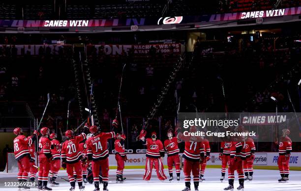 The Carolina Hurricanes participate in a Storm Surge celebration following a victory during an NHL game against the Nashville Predators on April 17,...