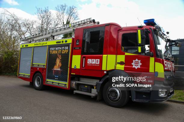 Fire truck seen parked on a roadside in London.