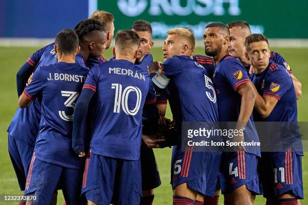 Chicago Fire starting XI gather in a huddle in action during a match between the Chicago Fireand the New England Revolution on April 17, 2021 at...
