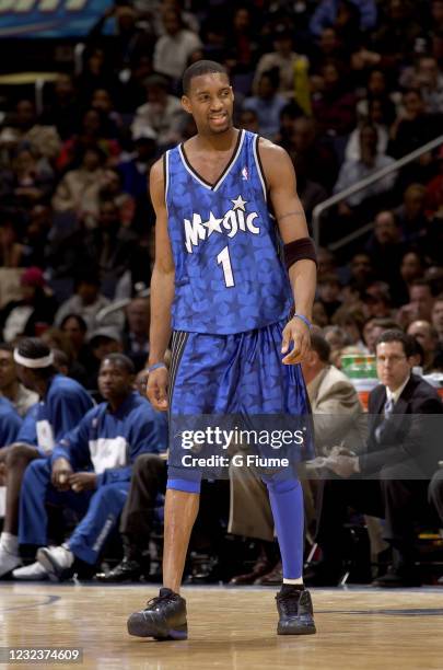 Tracy McGrady of the Orlando Magic reacts during the game against the Washington Wizards on March 11, 2003 at the MCI Center in Washington DC. NOTE...