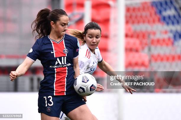 Paris Saint-Germains German midfielder Sara Dabritz fights for the ball with Lyons Spanish midfielder Damaris Egurrola during the UEFA Womens...