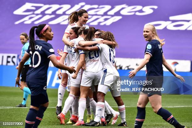 Lyon's players celebrate after US midfielder Catarina Macario scored a goal during the UEFA Womens Champions League quarter final football match...