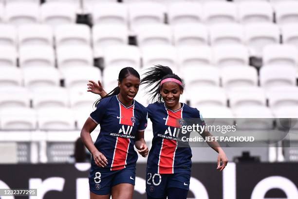 Paris Saint-Germains French midfielder Grace Geyoro celebrates with Paris Saint-Germains French defender Perle Morroni after scoring a goal during...