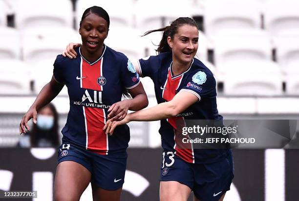 Paris Saint-Germains French midfielder Grace Geyoro celebrates with teammates after scoring a goal during the UEFA Womens Champions League quarter...