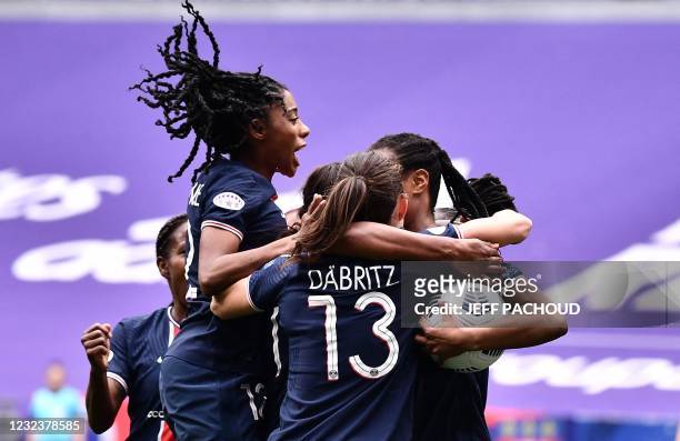 Paris' players celebrate after Lyons French defender Wendie Renard scored an own goal during the UEFA Womens Champions League quarter final football...