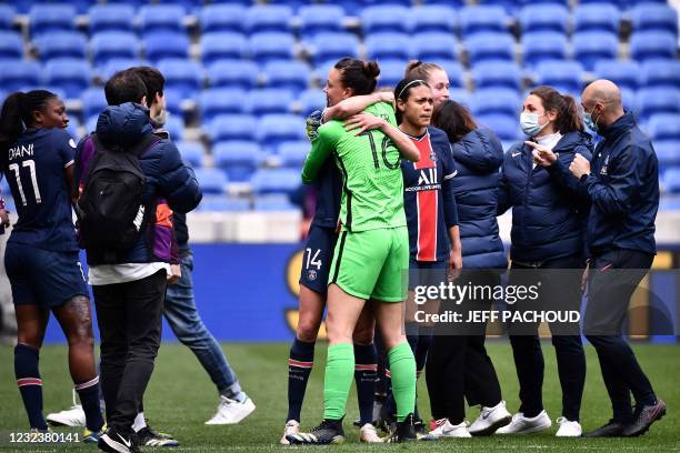 Paris Saint-Germain players celebrate as they win the quarter final UEFA Womens Champions League football match between Olympique Lyonnais and Paris...