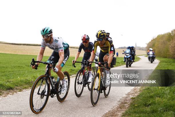 Germany's Max Schachmann , Britain's Tom Pidcock and Belgium's Wout van Aert compete in the Amstel Gold Race in Valkenburg on April 18, 2021. - Wout...