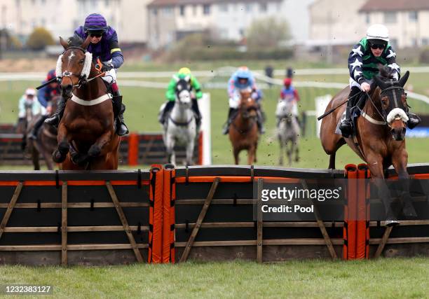 Floating Rock ridden by Nathan Brennan clears the last fence on their way to winning the Coral 'Fail To Finish' Free Bets 'Hands & Heels' Finale...