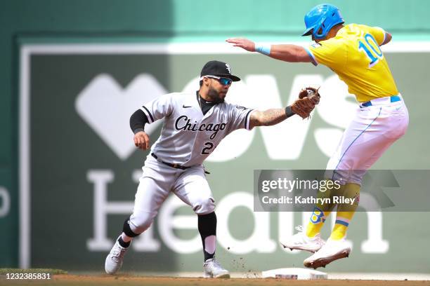 Hunter Renfroe of the Boston Red Sox tries to avoid the tag from Leury Garcia of the Chicago White Sox in the fourth inning during game one of a...