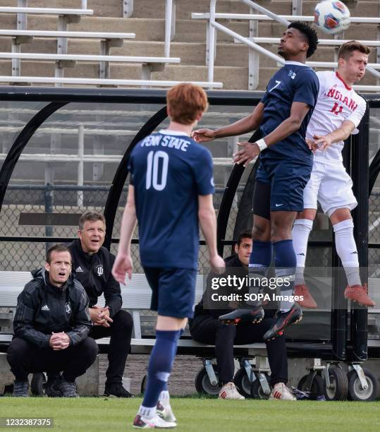 Indiana University coach Todd Yeagley, second from left on bench, watches Nyk Sessock play against Penn State's Liam Butts during the Big 10...