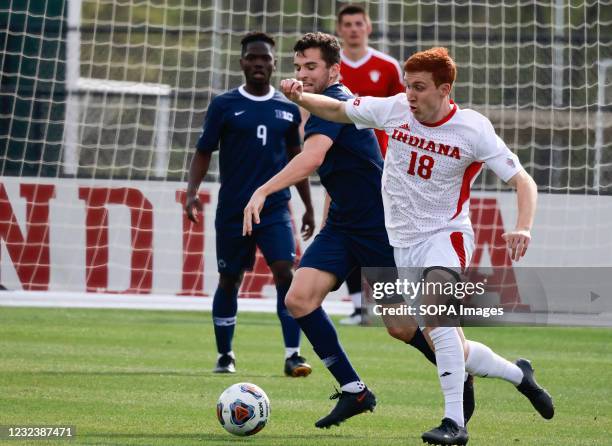 Indiana University's Ryan Wittenbrink and Penn State's Peter Mangione in action during the Big 10 Championship NCAA soccer game between Indiana...