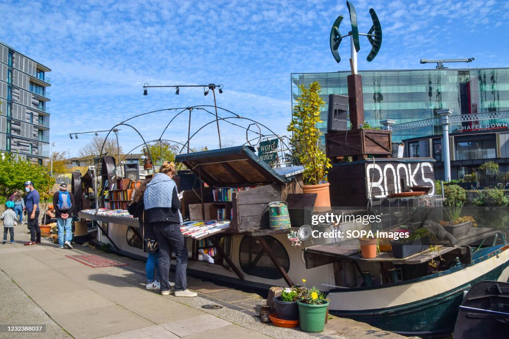 Customers browse the books at the Word On The Water floating...