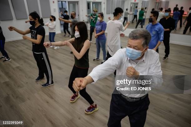 Members of New York's Asian American community attend a self-defense class organized by the Public Safety Patrol, a civil patrol team started in...