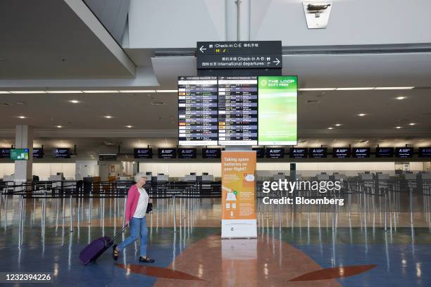 Check-in counters at Auckland International Airport in Auckland, New Zealand, on Monday, April 19, 2021. Australia and New Zealand on Monday started...