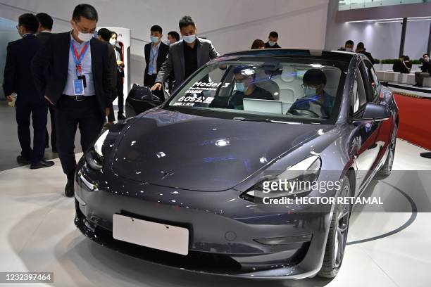 Tesla model 3 is seen during the 19th Shanghai International Automobile Industry Exhibition in Shanghai on April 19, 2021.