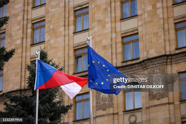 Czech and a European Union flags flies at the Czech embassy in Moscow on April 19, 2021. - Russia on April 18, 2021 announced the expulsion of 20...