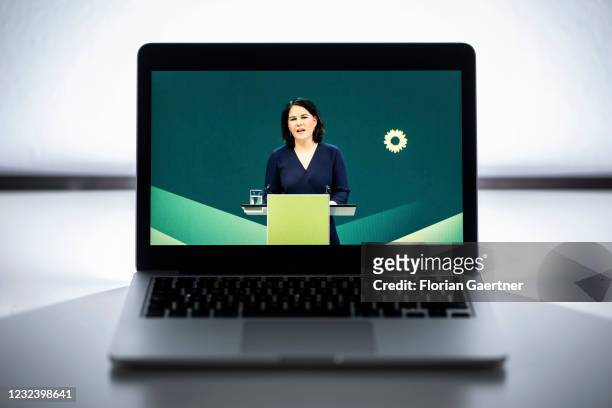 Annalena Baerbock, co-leader of the German Greens Party , is pictured on a screen during a livestream on April 19, 2021 in Berlin, Germany. The Green...