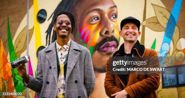 Surinamese singer-songwriter and Eurovision candidate in the run-up to the Eurovision Song Contest Jeangu Macrooy , poses with artist Tymon de Laat,...