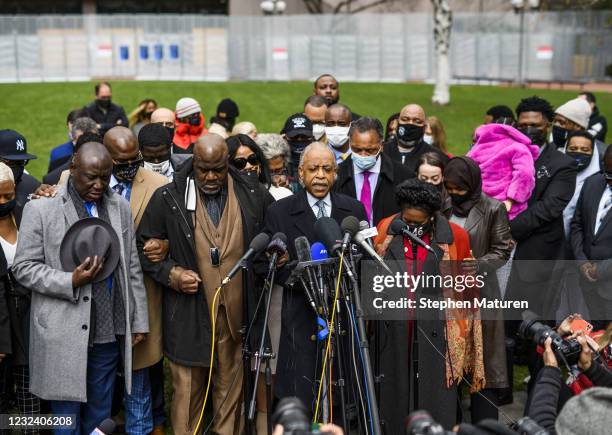 Rev. Al Sharpton says a prayer as he is joined by the family of George Floyd outside the Hennepin County Government Center on April 19, 2021 in...