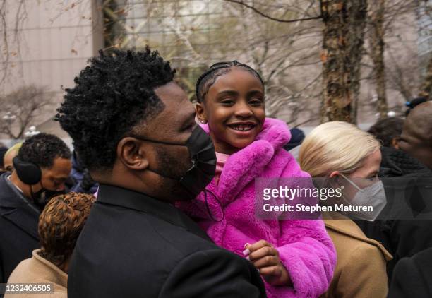 Gianna Floyd, daughter of George Floyd , is carried away after a press conference outside the Hennepin County Government Center on April 19, 2021 in...