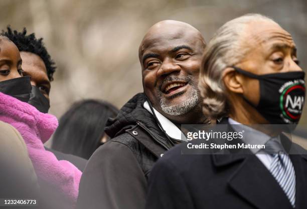 Rodney Floyd smiles during a press conference with Rev. Al Sharpton outside the Hennepin County Government Center on April 19, 2021 in Minneapolis,...