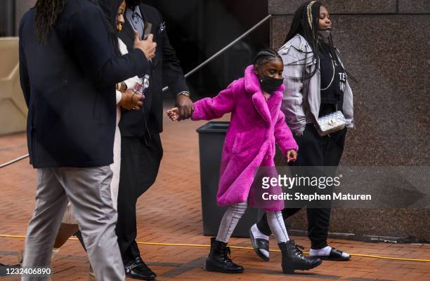 Roxie Washington , and her daughter Gianna Floyd , whose father was George Floyd, enter the Hennepin County Government Center on April 19, 2021 in...